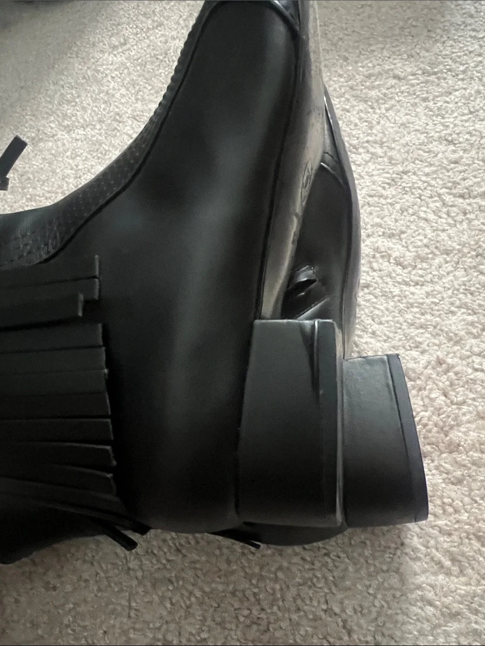CHANEL Black Leather Heeled Ankle Boots with CC Embossing